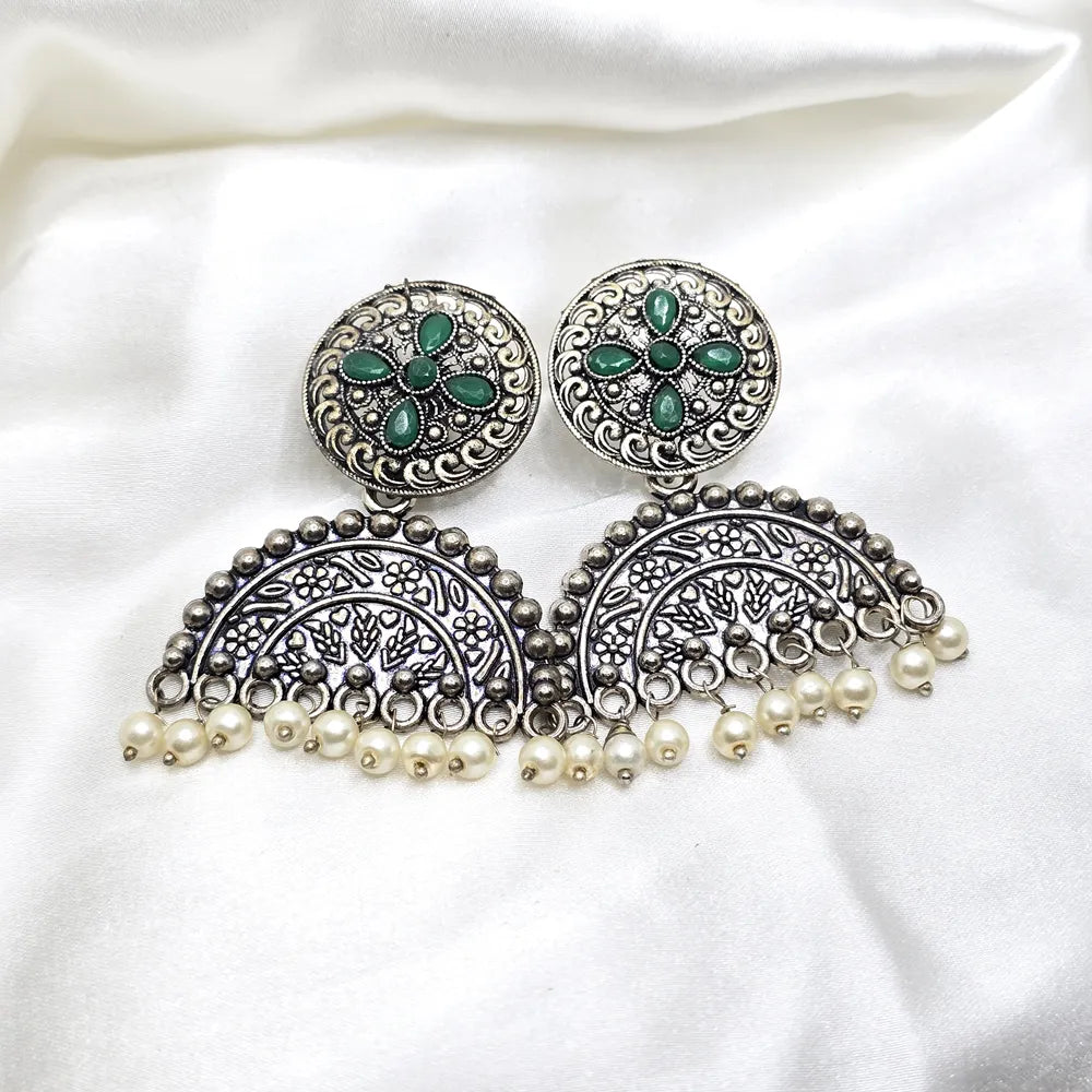 Ojasv German silver earrings