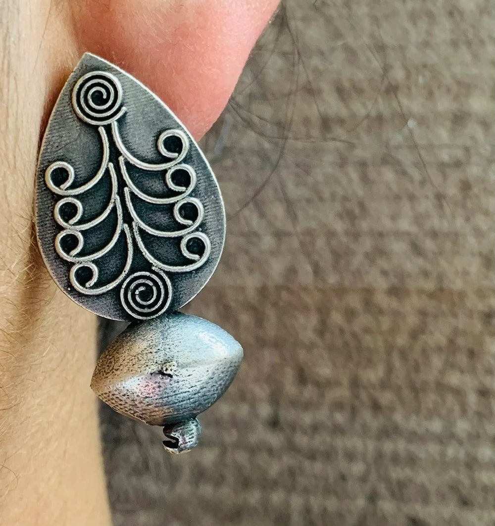 Dhrishika German silver earring